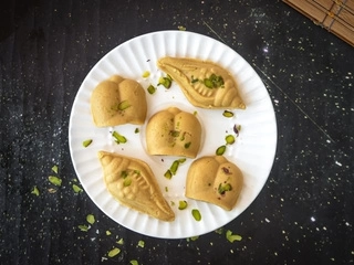 Nolen Gur Sandesh (Sankh) [2pcs]
