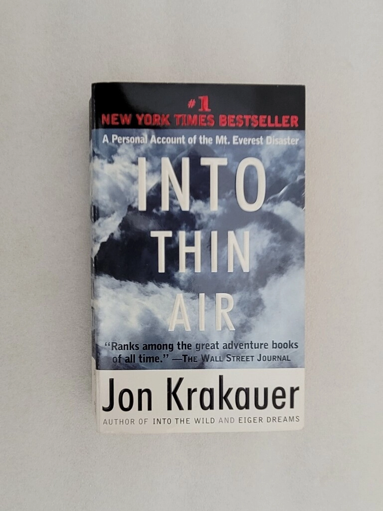 Into Thin Air: A Personal Account of the Mt. Everest Disaster (used, readable condition, paperback)