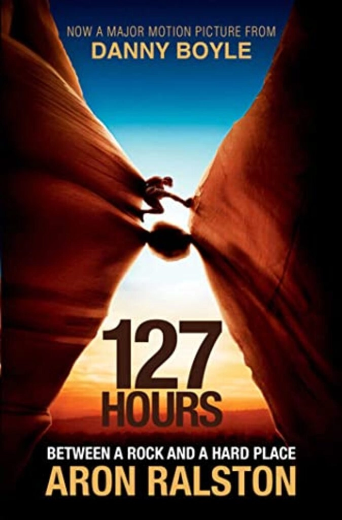 127 hours between a rock and a hard place  (used,paper back,good condition)
