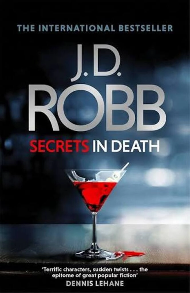 secrets in death (used,paper back, good condition)