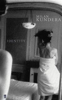 identity (used,paper back, good condition)