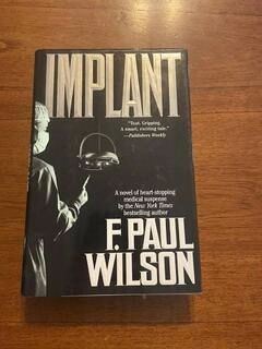 implant (used,hard cover,good condition)